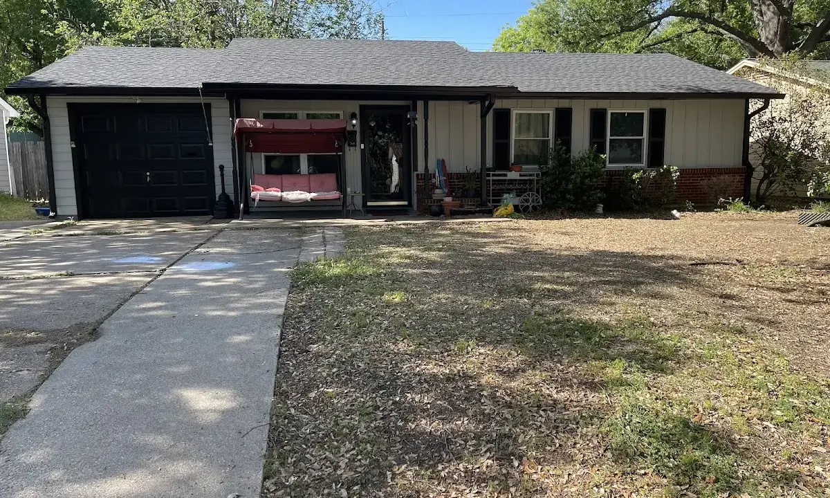 Asphalt Shingle Roof Repair crew at work on a residential roof in Panama City